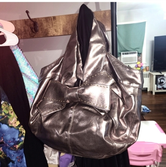 NWOT Rare♡Vintage♡☆Twist of fate☆ Betsey johnson silver bag. - Picture 1 of 10